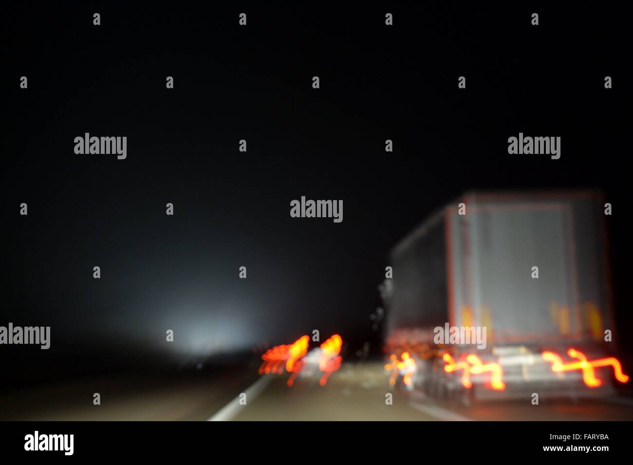 Cars on a german Highway at night, Germany, 16. December 2015. Photo: Frank May Stock Photo