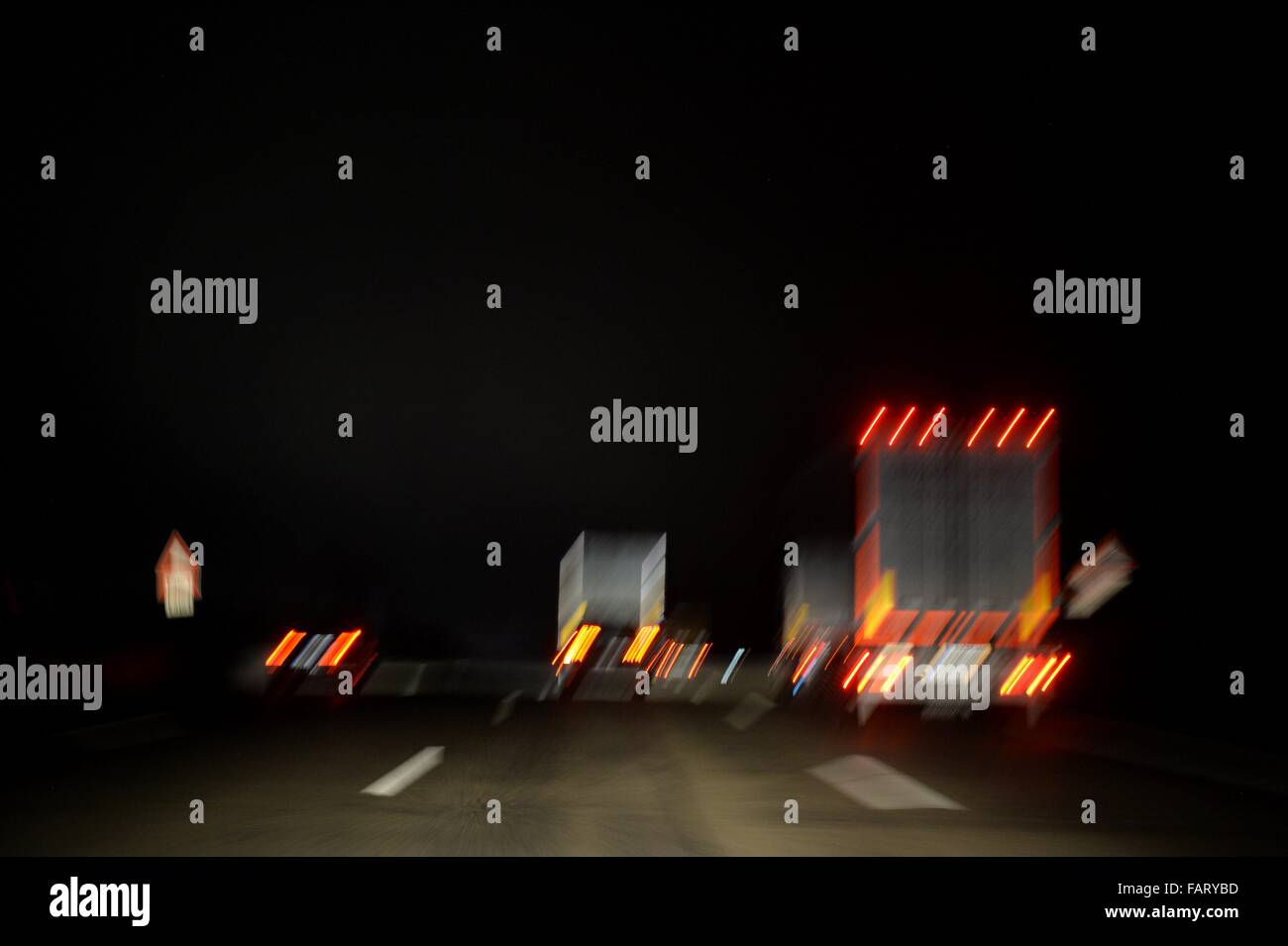 Cars on a german Highway at night, Germany, 16. December 2015. Photo: Frank May Stock Photo