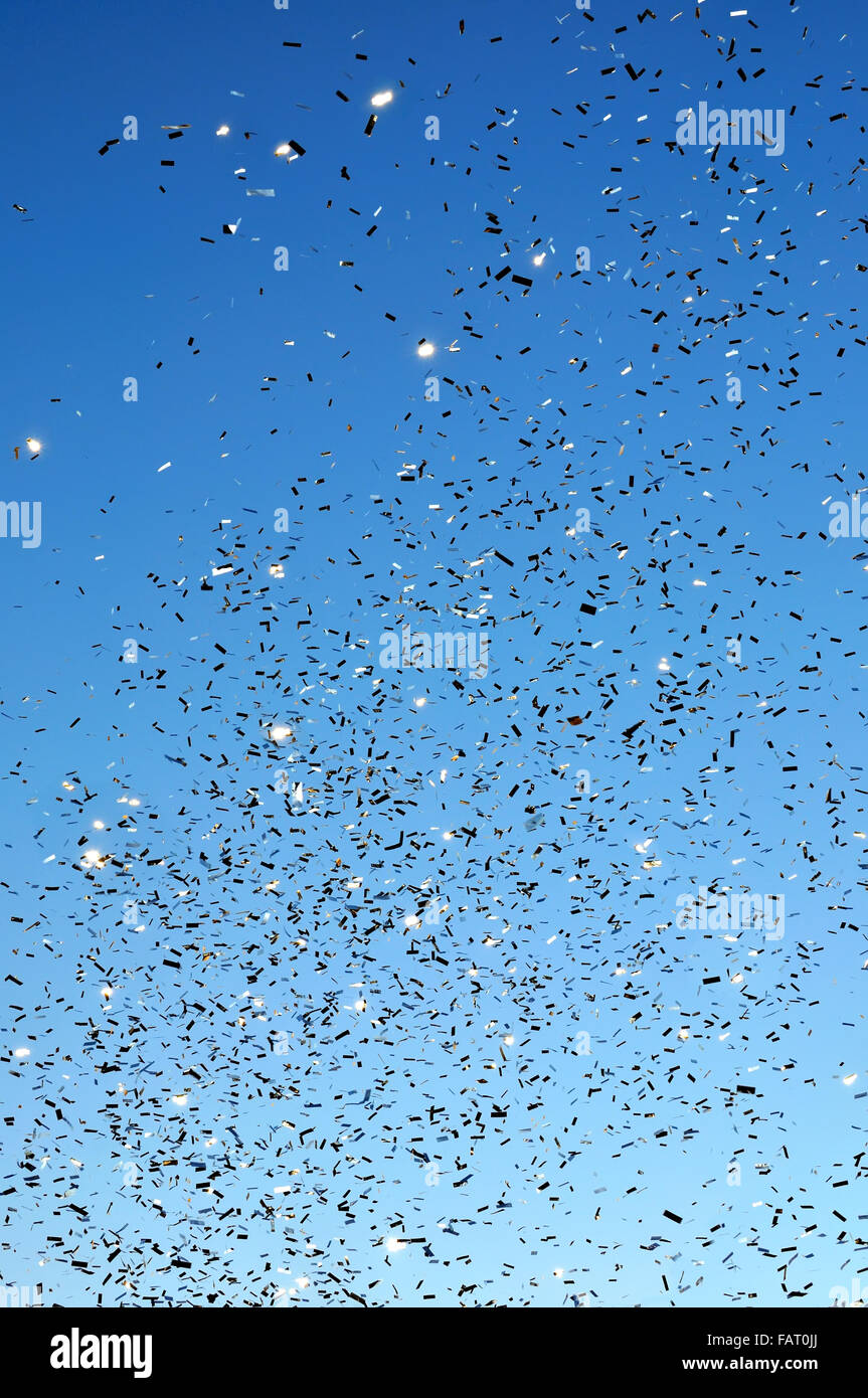 falling confetti in the city festival Stock Photo - Alamy