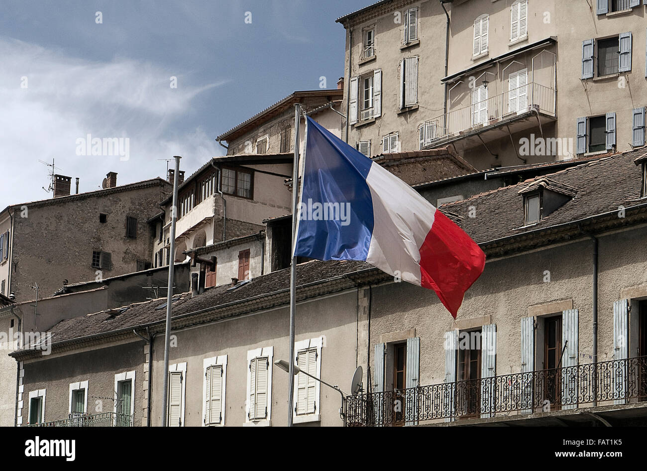 French tricolor flying in Serres town near Gap French Alps Stock Photo