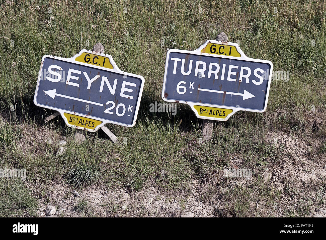 Old road signs on Momte Carlo Rally stage. Stock Photo