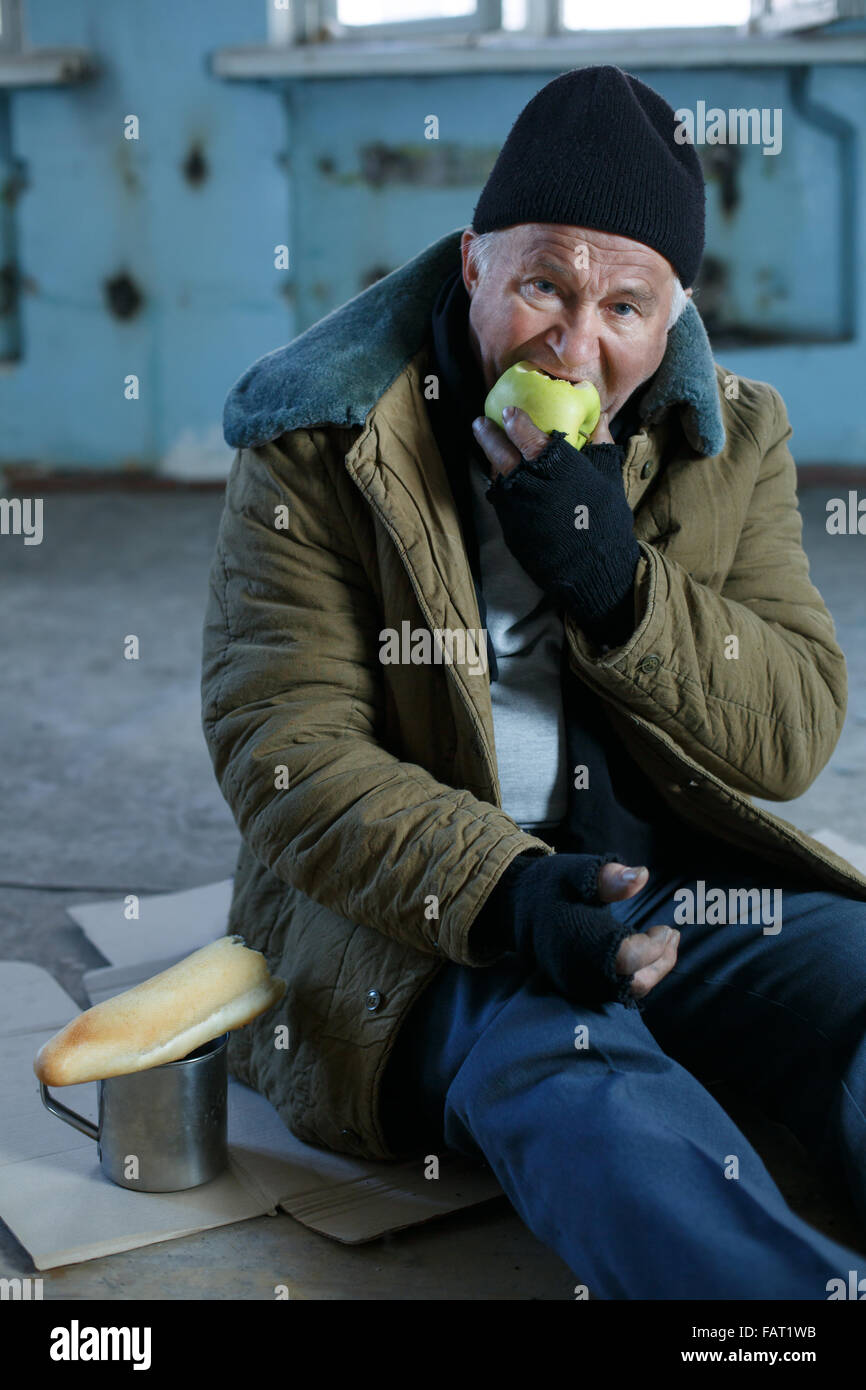 Homeless man eating hires stock photography and images Alamy
