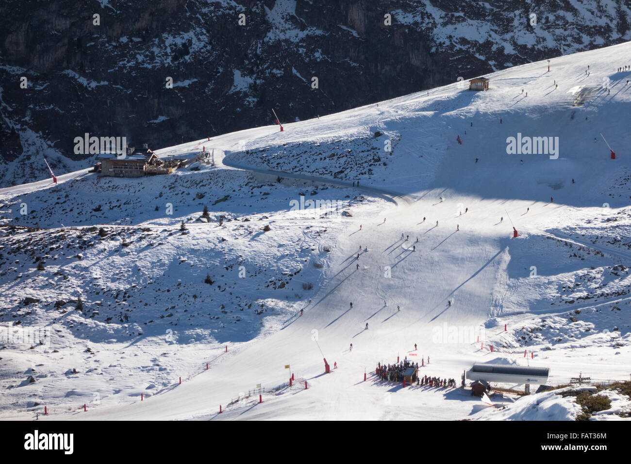 shadows of skiers and snowboarders in Courchevel 1850, Three Valleys, France Stock Photo