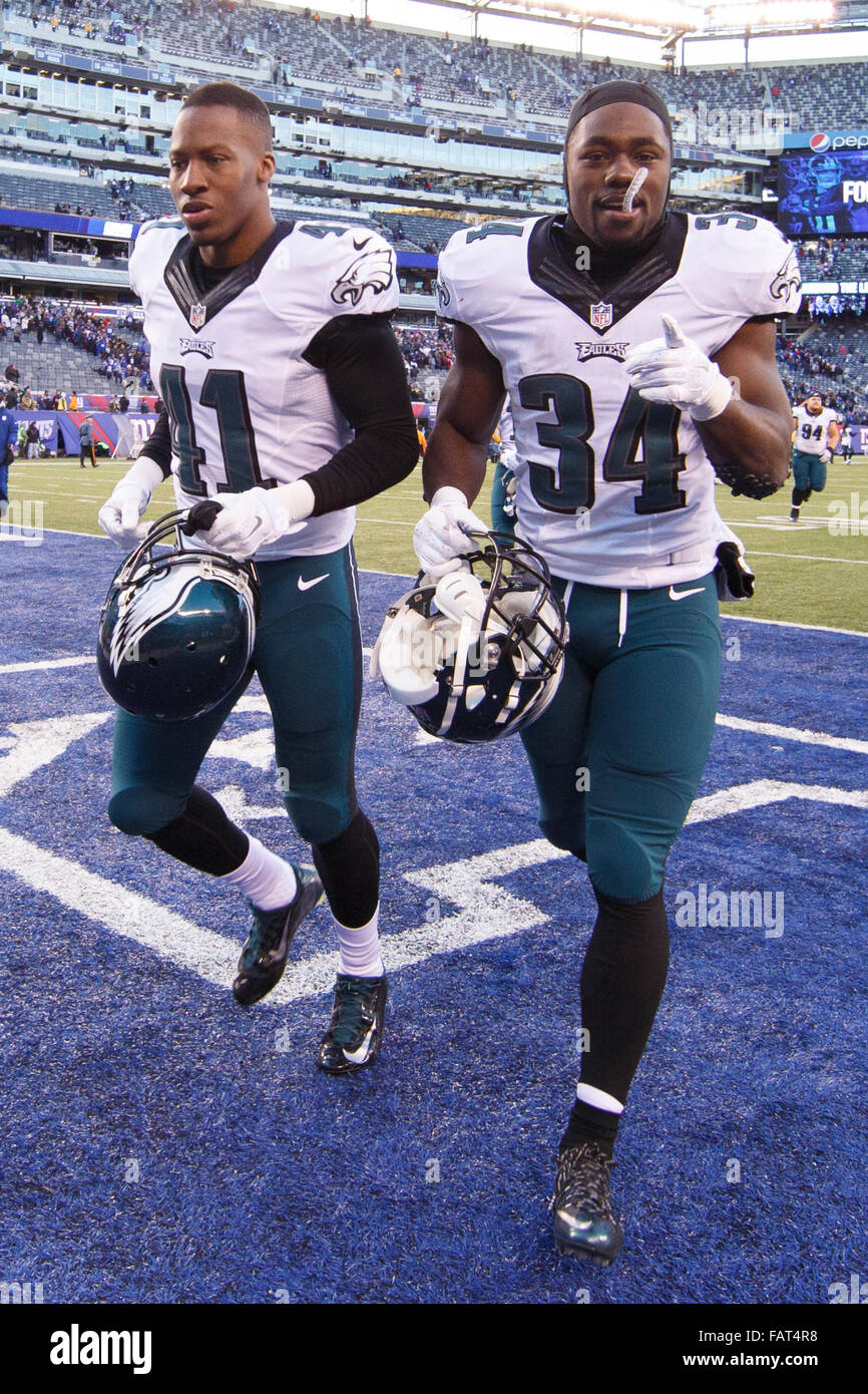 East Rutherford, New Jersey, USA. 3rd Jan, 2016. Philadelphia Eagles running back Kenjon Barner (34) and defense back Randall Evans (41) head off the field following the NFL game between the Philadelphia Eagles and the New York Giants at MetLife Stadium in East Rutherford, New Jersey. The Philadelphia Eagles won 35-30. Christopher Szagola/CSM/Alamy Live News Stock Photo