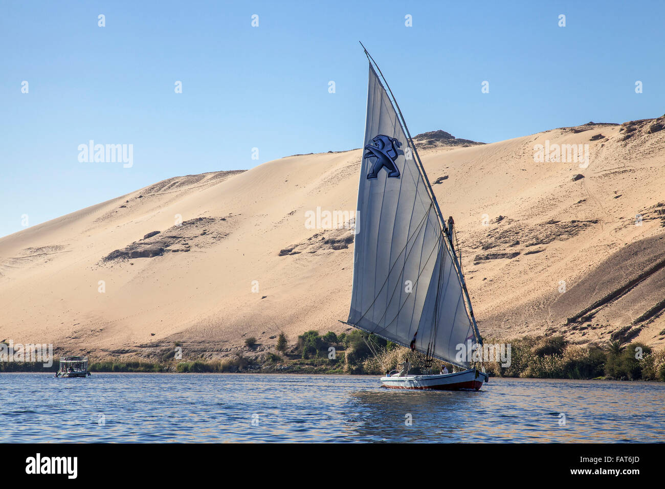 Felucca, traditional wooden sailing boat on the river Nile near Aswan southern Egypt Stock Photo