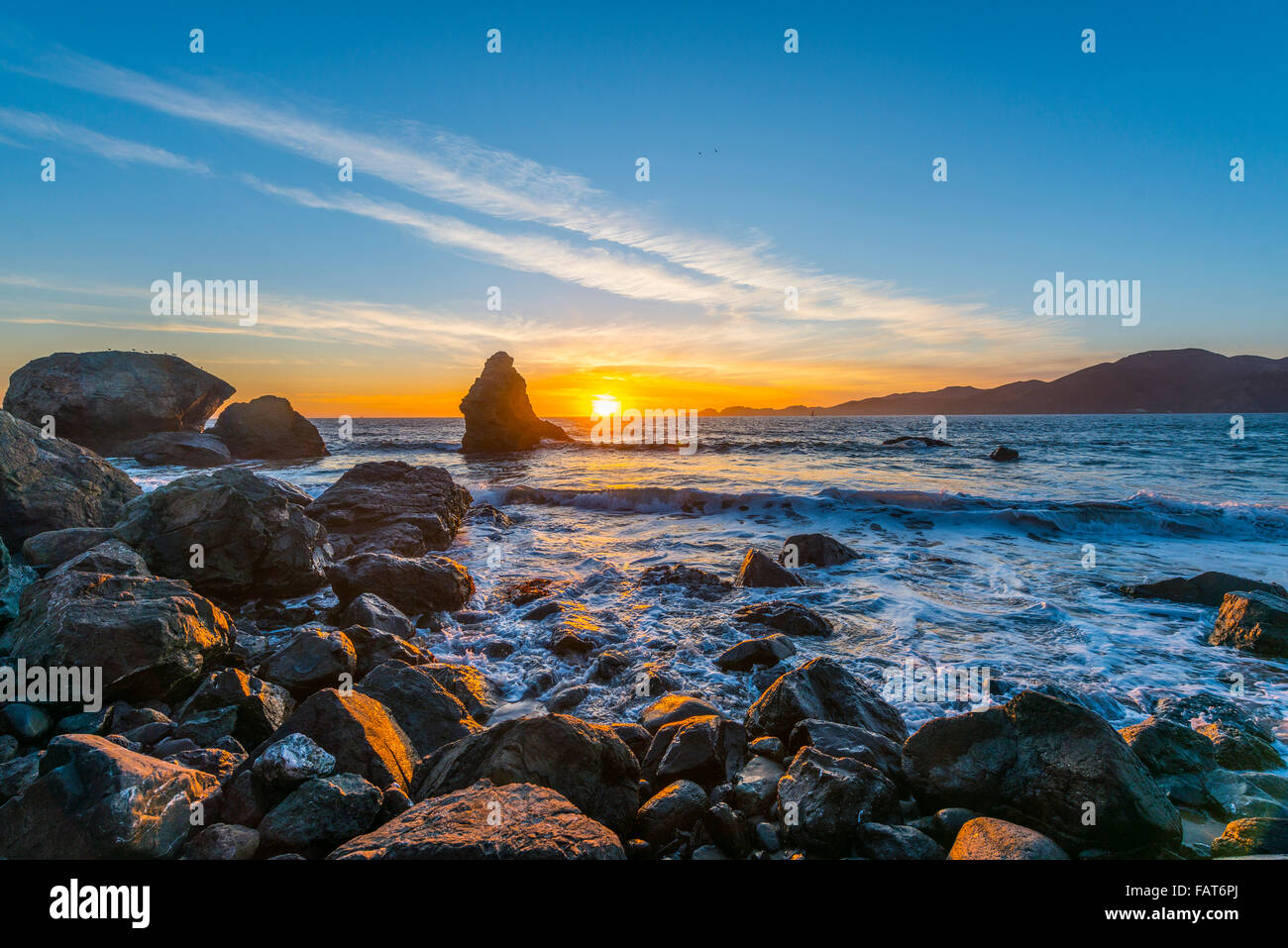 Sunset on Marshall's Beach, Rocky Coast, San Francisco, USA Stock Photo