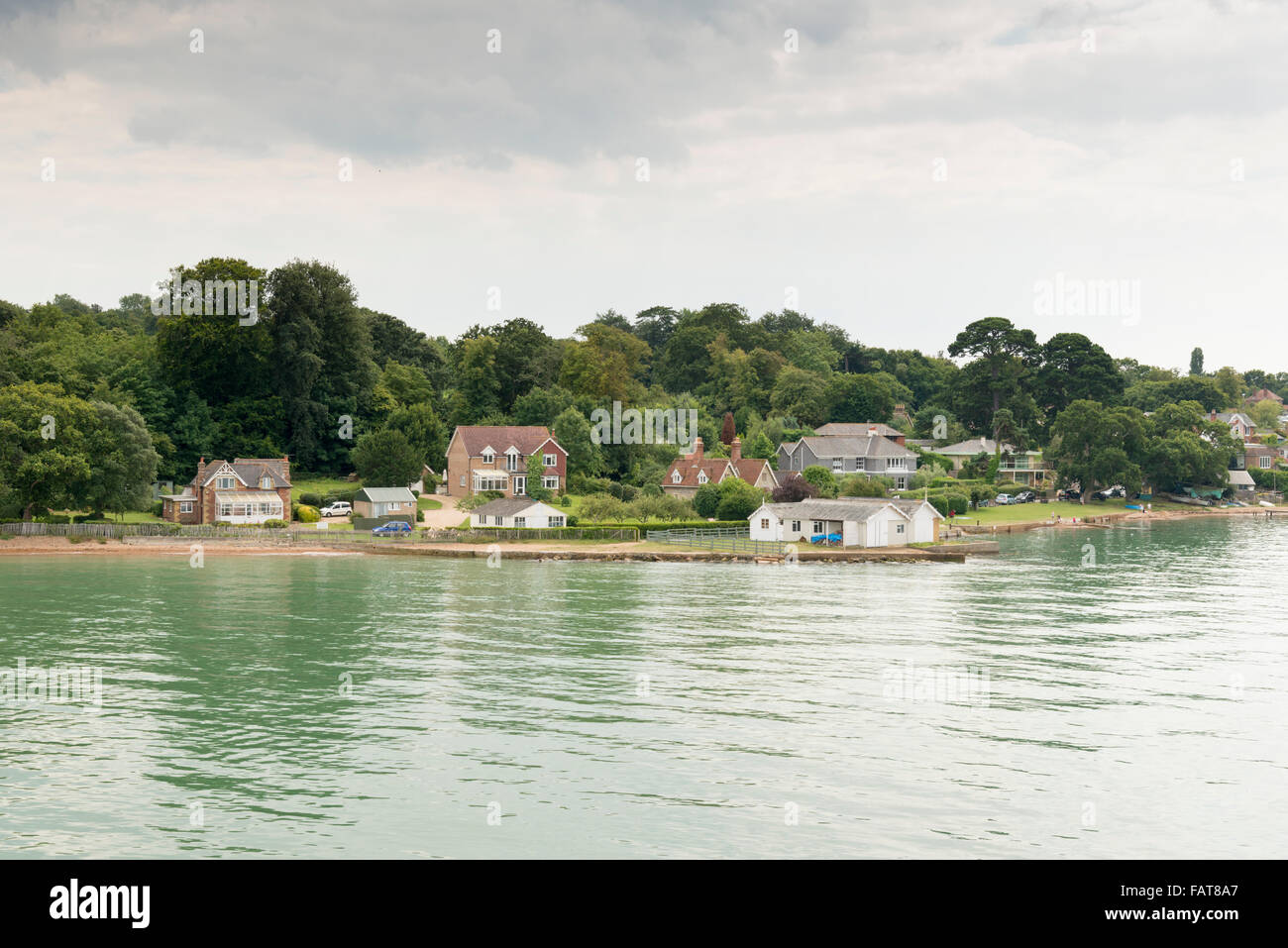 Houses and buildings on the estuary at Wootton Creek at Fishbourne Isle