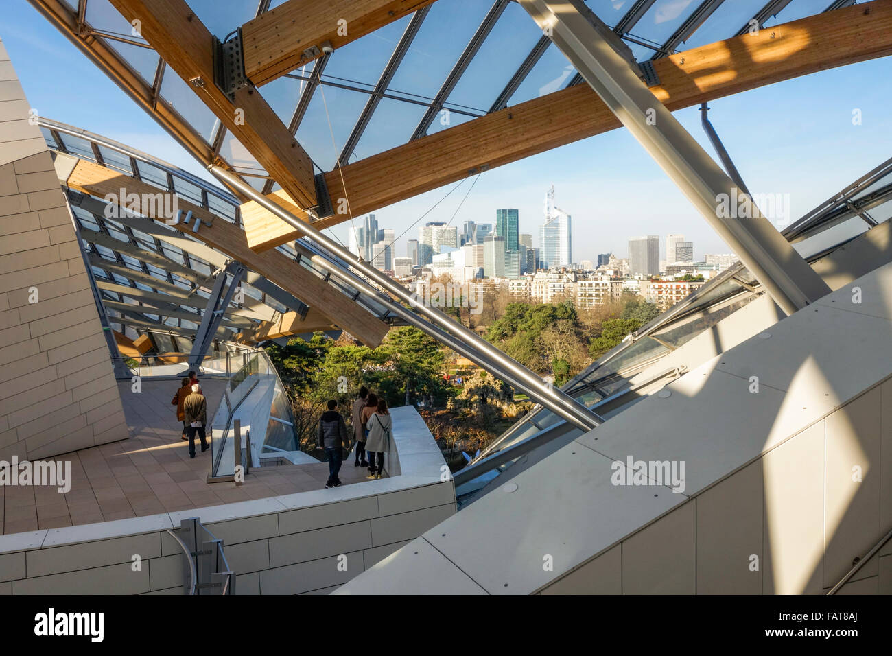 Louis Vuitton Foundation, by architect Frank Gehry, art museum. La defense  in background at Bois de Boulogne, Paris, France Stock Photo - Alamy