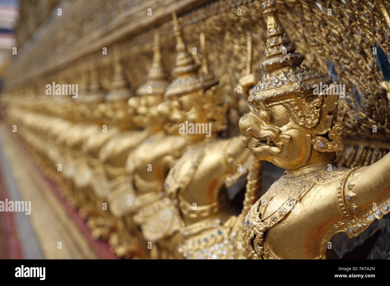 Garudas and nagas on external decorations of the Ubosoth, Wat Phra Kaew temple, Grand Palace, Bangkok, Thailand Stock Photo