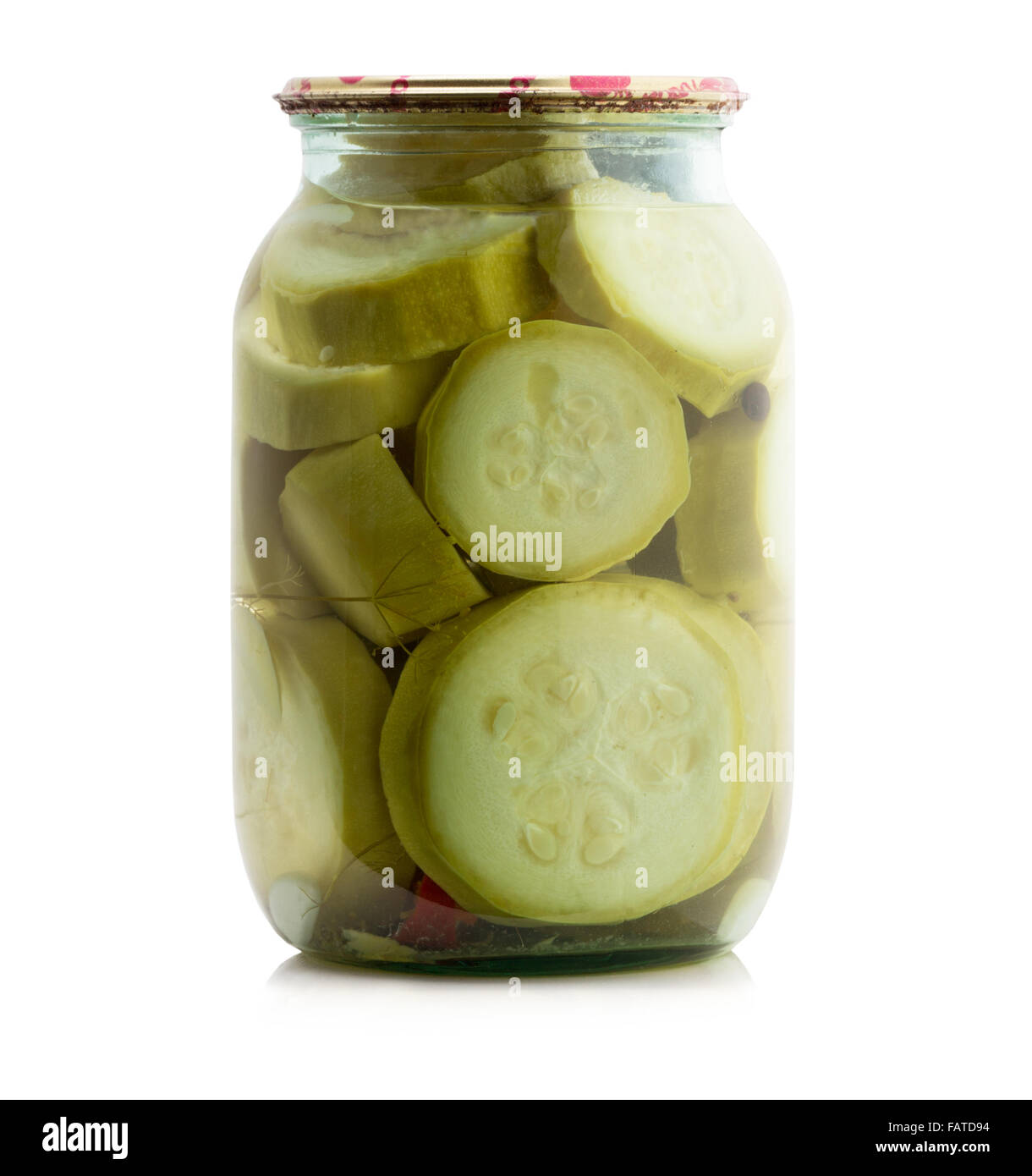 Marinated squash canned in glass jar isolated on the white background. Stock Photo