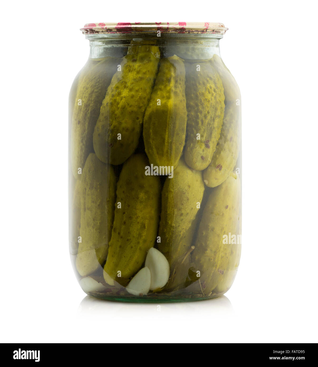 Marinated cocumbers canned in glass jar isolated on the white background. Stock Photo