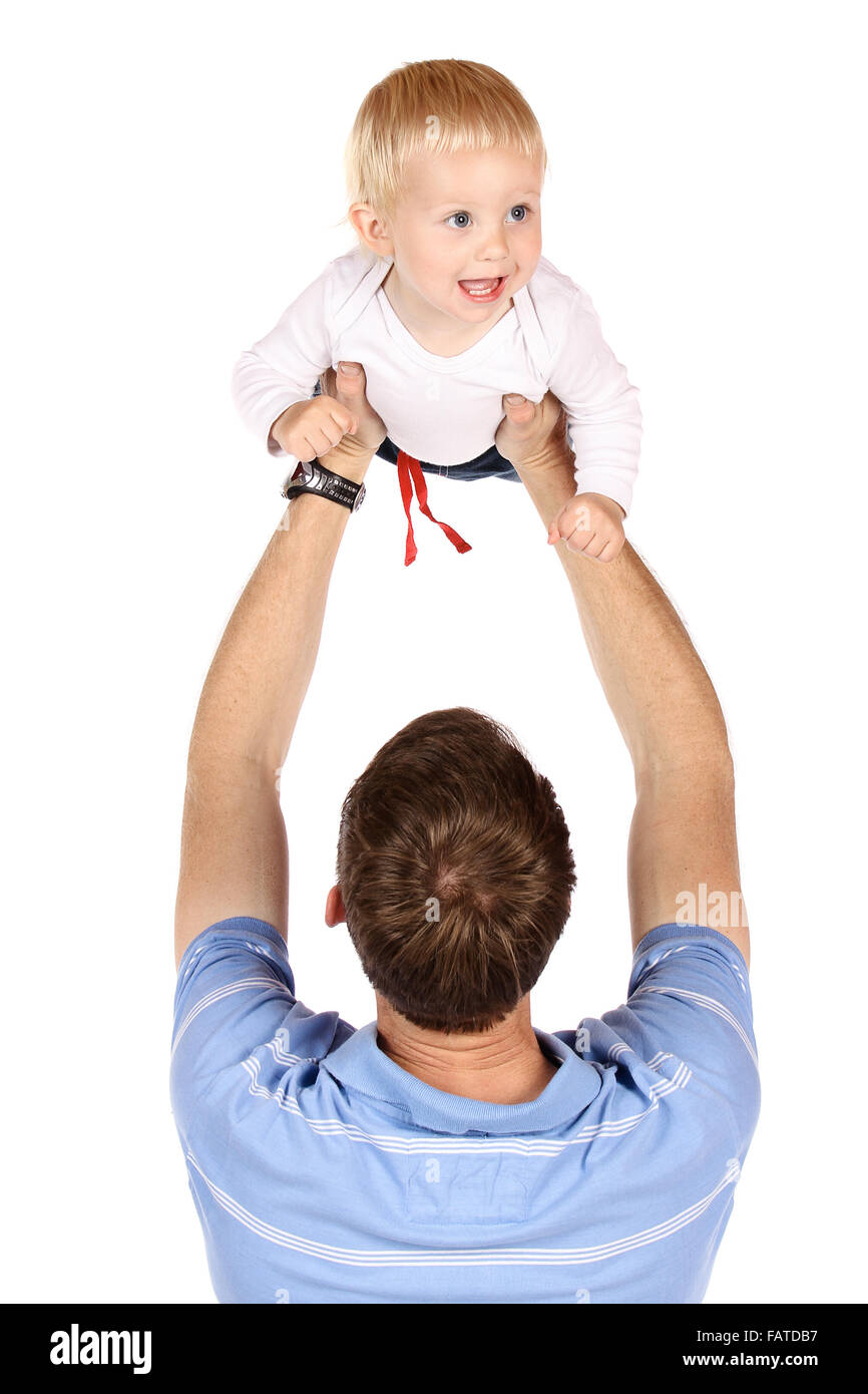 Happy caucasian dad holding his baby boy. Image is isolated on a white background. Stock Photo