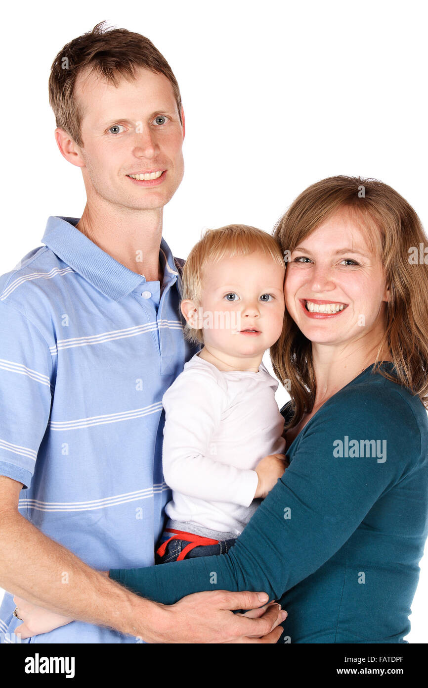 Caucasian family with mom dad and baby boy. Image is isolated on a white background. Stock Photo