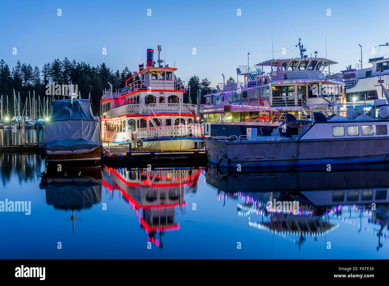 Christmas lights on tour boats,  Coal Harbour, Vancouver, British Columbia, Canada Stock Photo