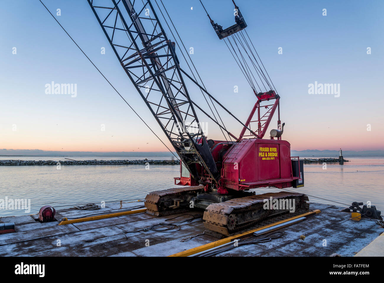 Fraser River Pile and Dredge, pile driving crane on barge, Steveston, Richmond, British Columbia, Canada, Stock Photo