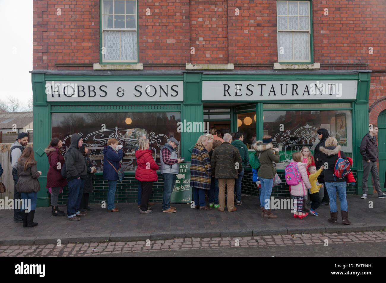 Queue outside an old fashioned British fish and chip shop, Black Country Living Museum, Dudley UK Stock Photo