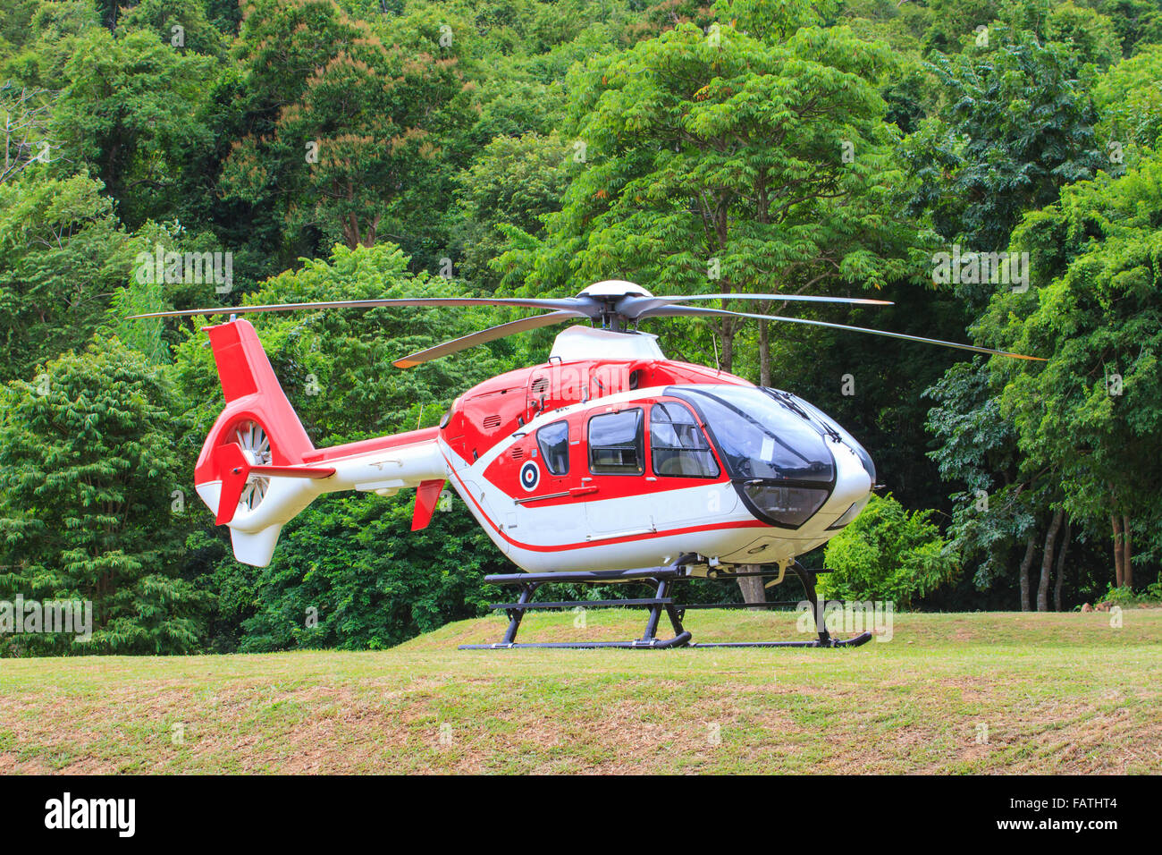 helicopter standing on landing strip in airfield Stock Photo Alamy