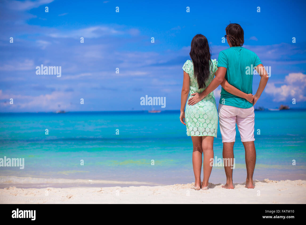 Young happy couple have fun during beach vacation Stock Photo - Alamy