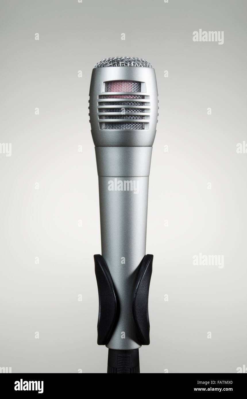 Microphone with grey background Stock Photo Alamy