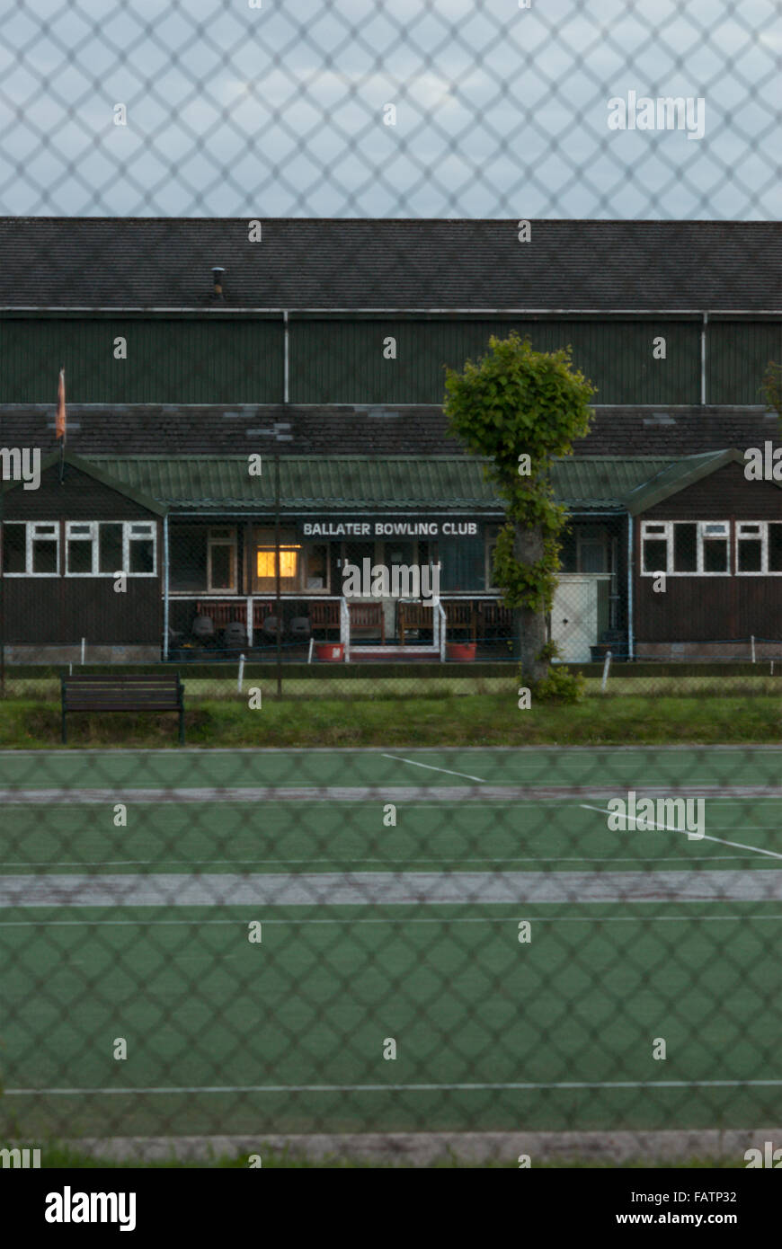 Looking across tennis courts and bowling green to Ballater Bowling Club clubhouse. Stock Photo