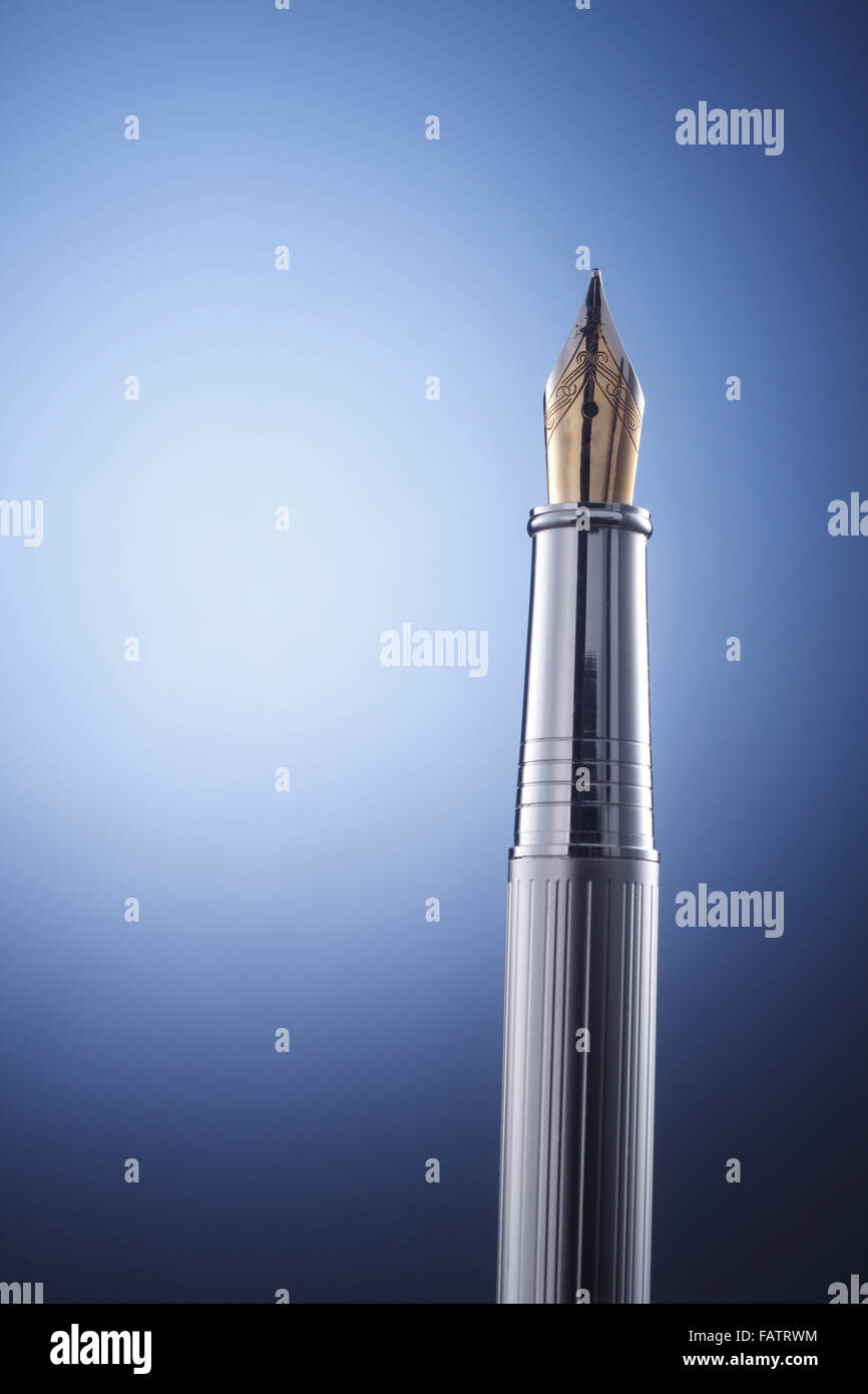 fountain pen on the color background Stock Photo - Alamy