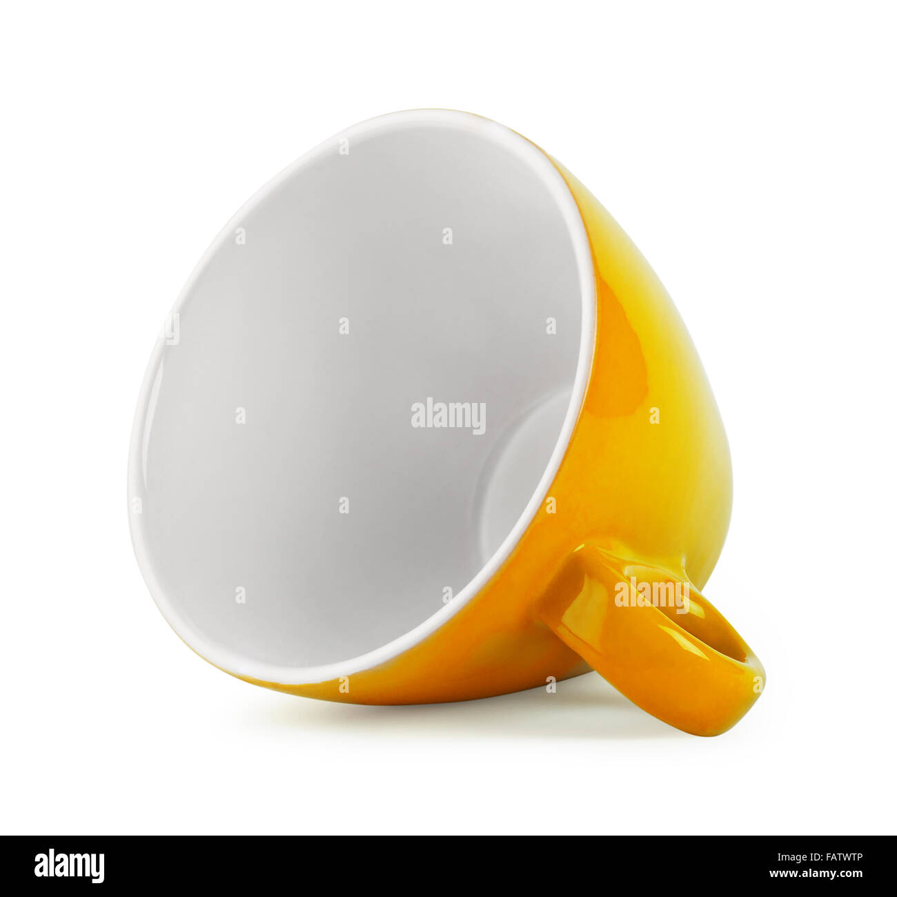 Yellow cup lying sideways isolated on white background Stock Photo - Alamy