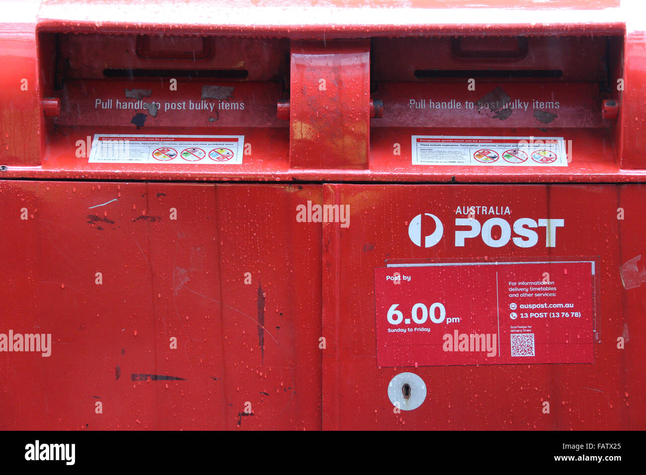 Sydney, Australia. 5 January 2016. Australia Post has received complaints for increasing the price of a stamp for regular mail from 70c to $1 as well as introducing slower delivery times. Pictured: Post boxes on Margaret Street. Credit: Richard Milnes/Alamy Live News Stock Photo