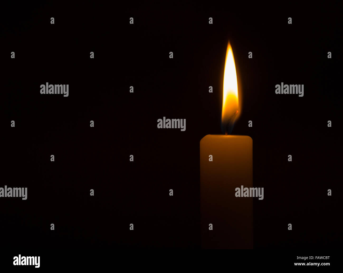 candle flame in the dark Stock Photo