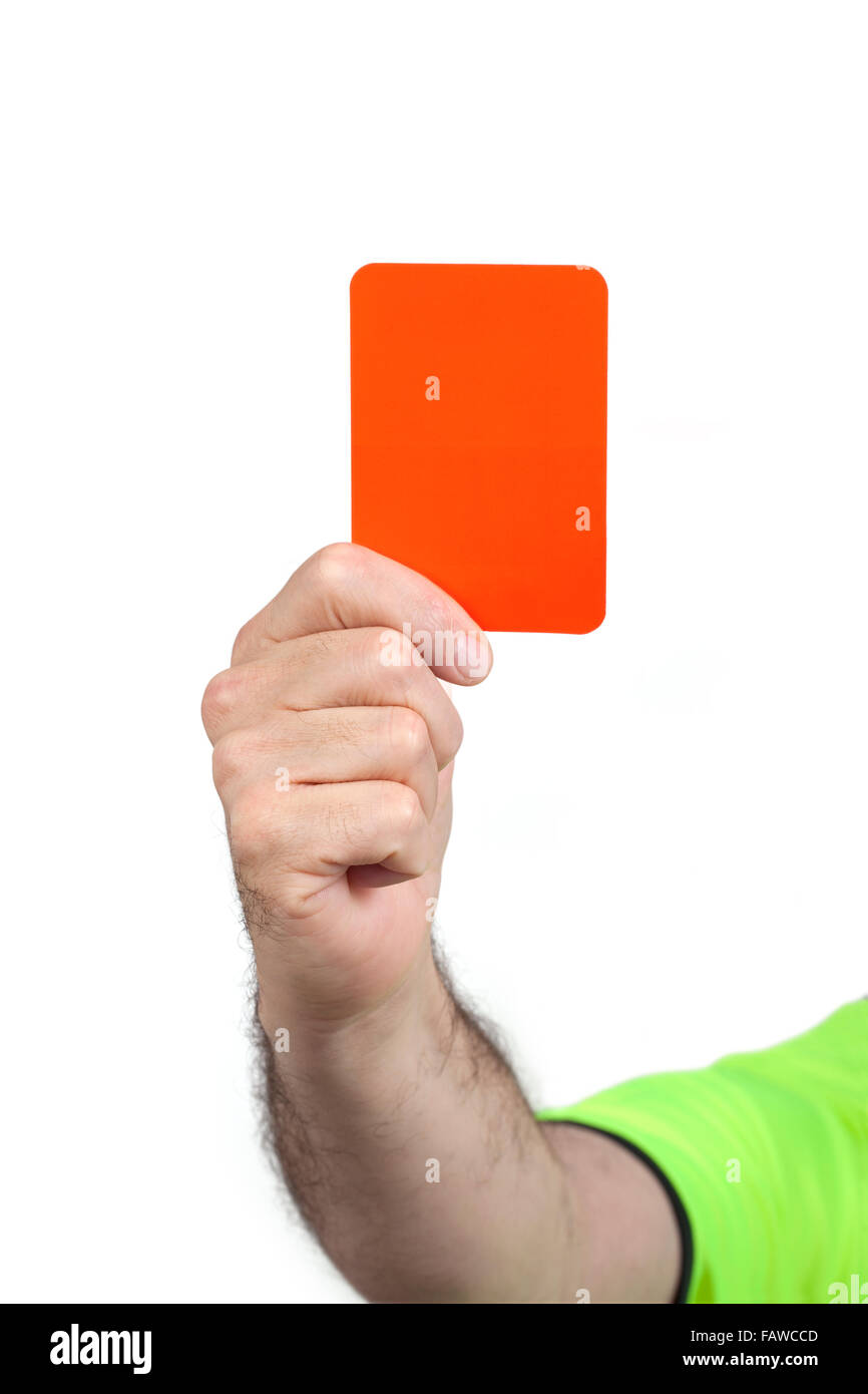 Referee hand holding a red card for punishment isolated on white background. The image contains clipping path. Stock Photo