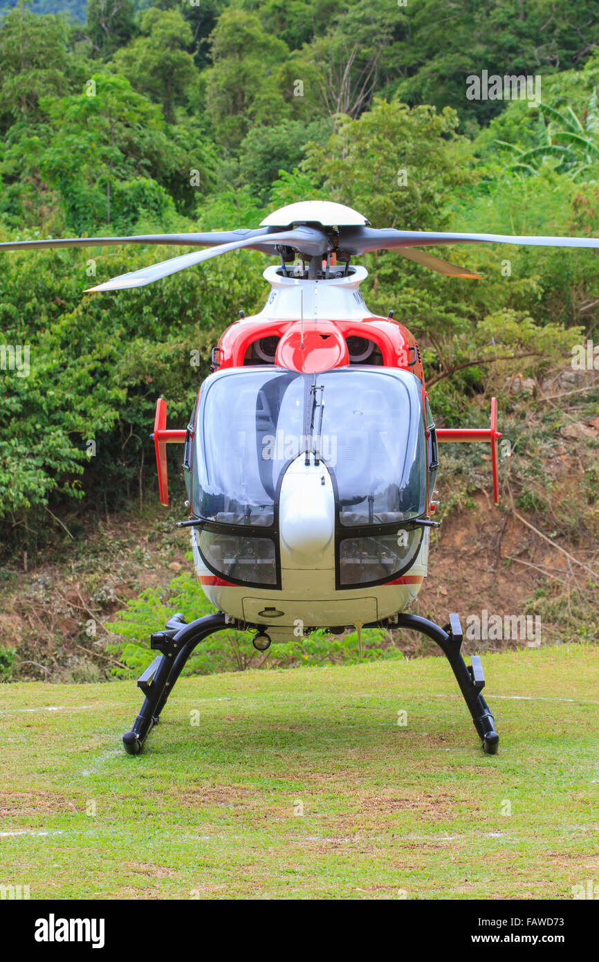 helicopter standing on landing strip in airfield Stock Photo Alamy