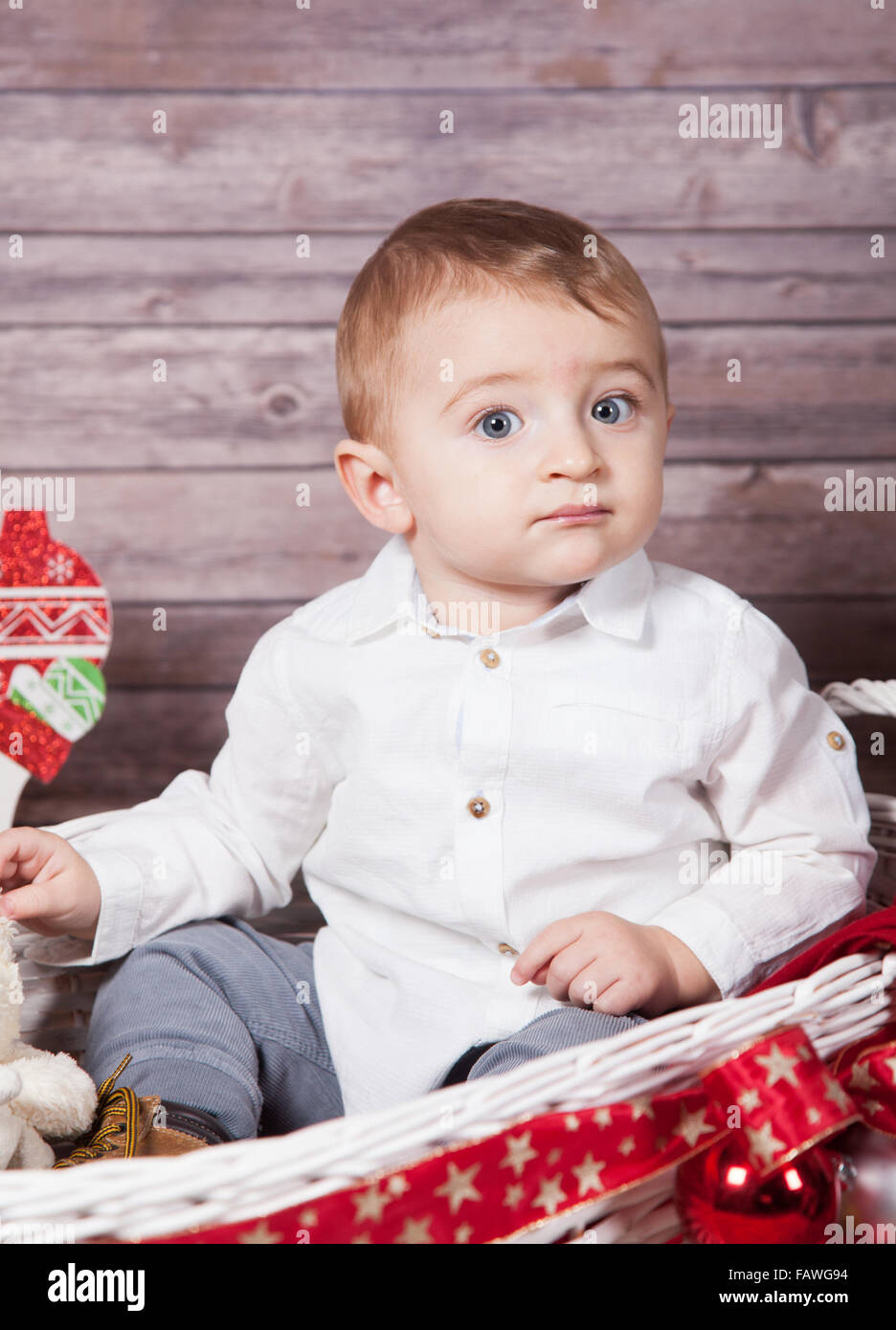 Portrait of 1 year old baby boy, Christmas theme, studio shot Stock