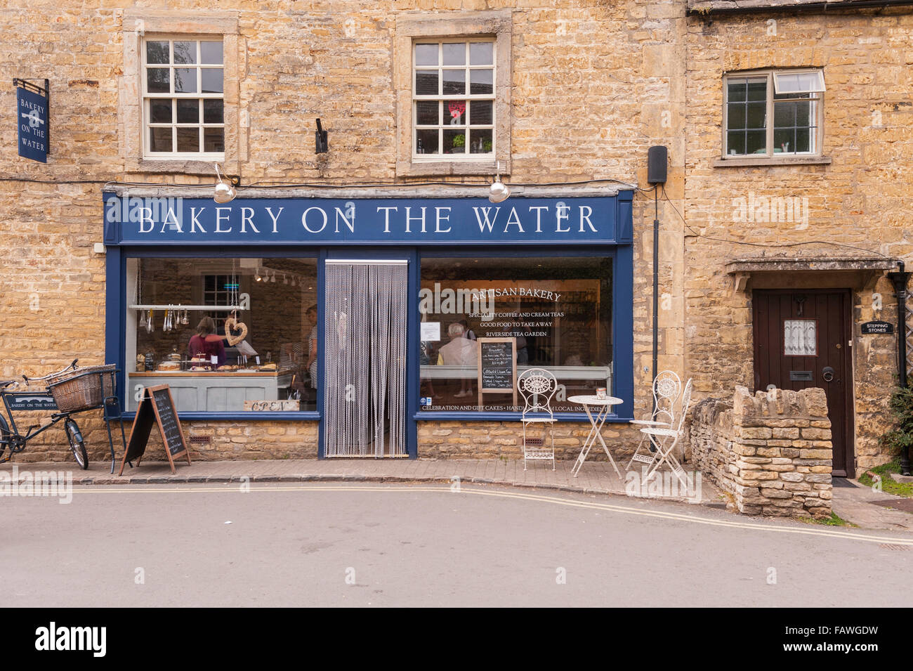 The Bakery on the water at Bourton-On-The-Water in Gloucestershire , England , Britain , Uk Stock Photo