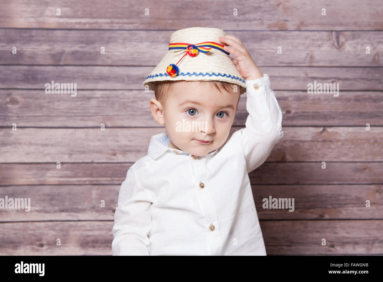 Portrait of a 1 year old baby boy wearing a Romanian traditional