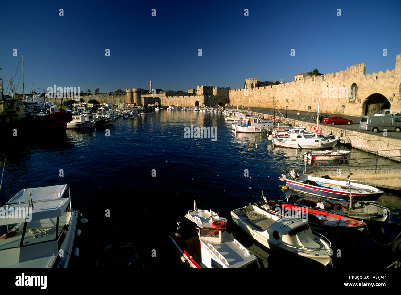 Greece, Dodecanese Islands, Rhodes, port and old town walls Stock Photo