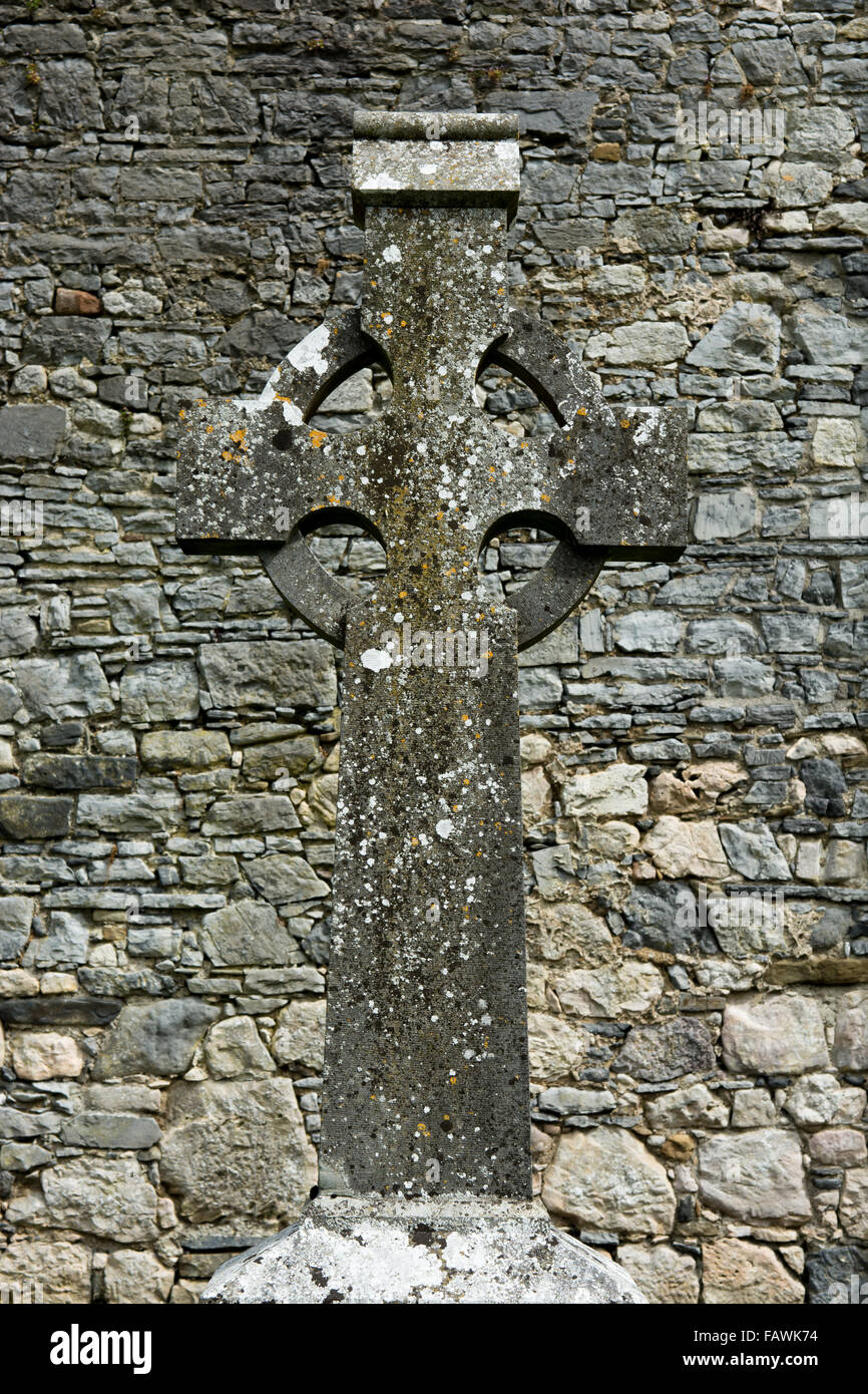 Celtic Cross in Front of Old Stone Wall Stock Photo - Alamy