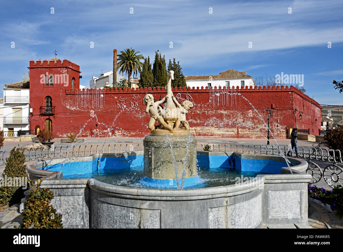Moorish red castle walls in Plaza de la Constitucion Alhama de Granada ( 1482 the fortress town was taken from the Moorish Sultanate ) Spanish Spain Andalusia Stock Photo