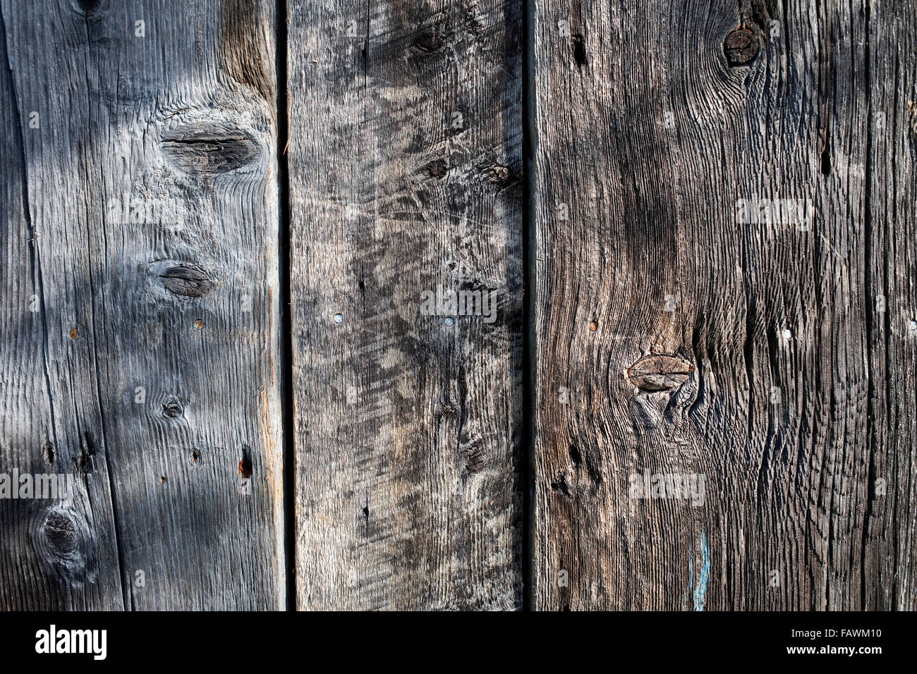 Close up of a wall of old boards with knots; Quebec, Canada Stock Photo