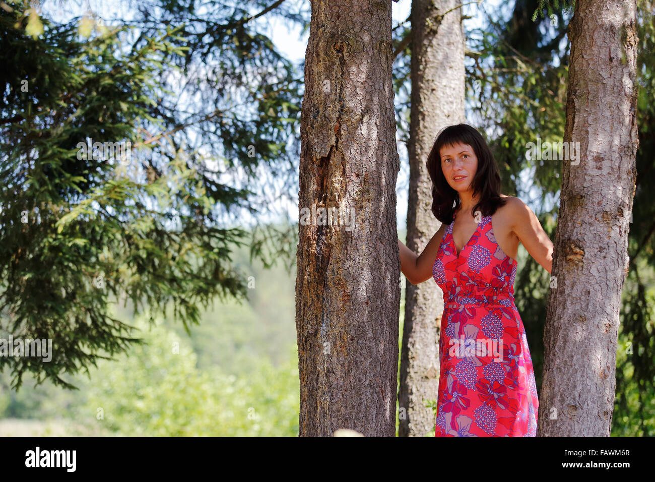 Mid Adult Women in a summer forest Stock Photo