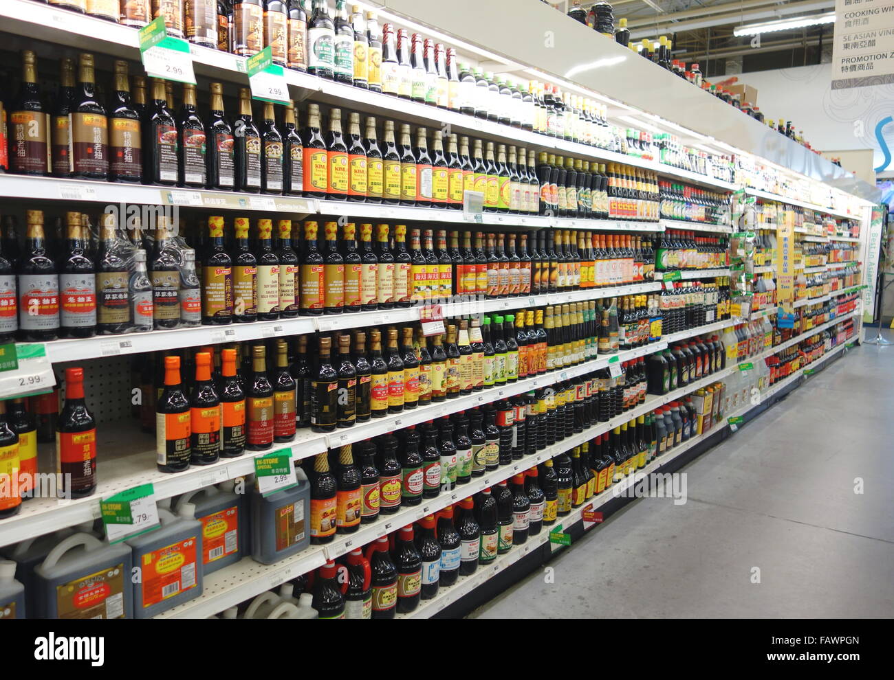 Sauce bottles on a Chinese supermarket shelf in Toronto, Canada Stock