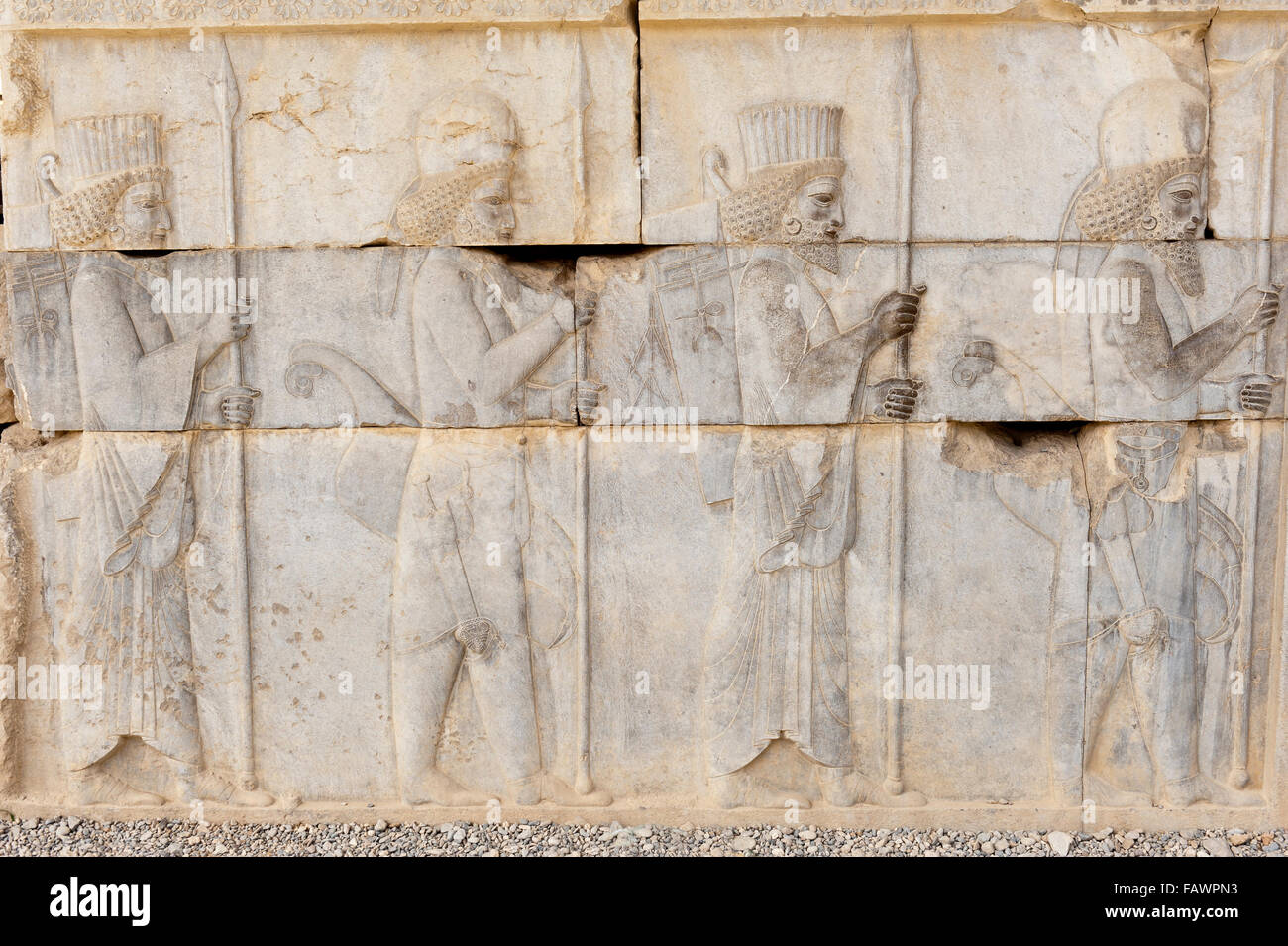 Ancient relief of the Achaemenids, Persians and the Medes, soldiers of the Immortal Guard on the Apadana Palace Stock Photo