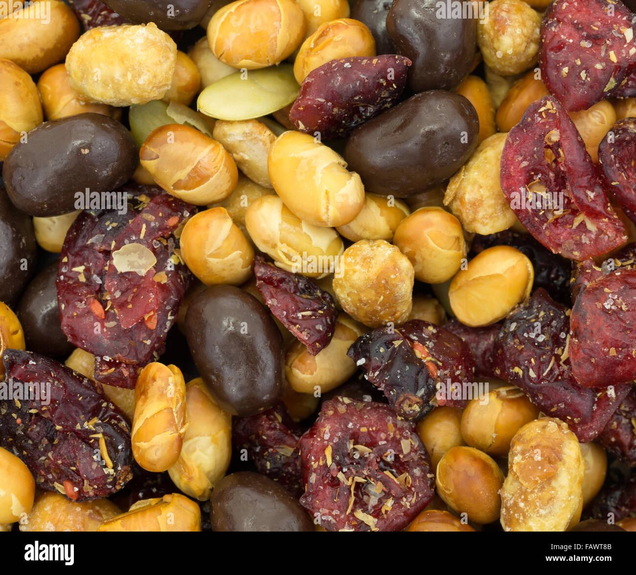 A very close view of trail mix with soy beans, dried cranberries and
