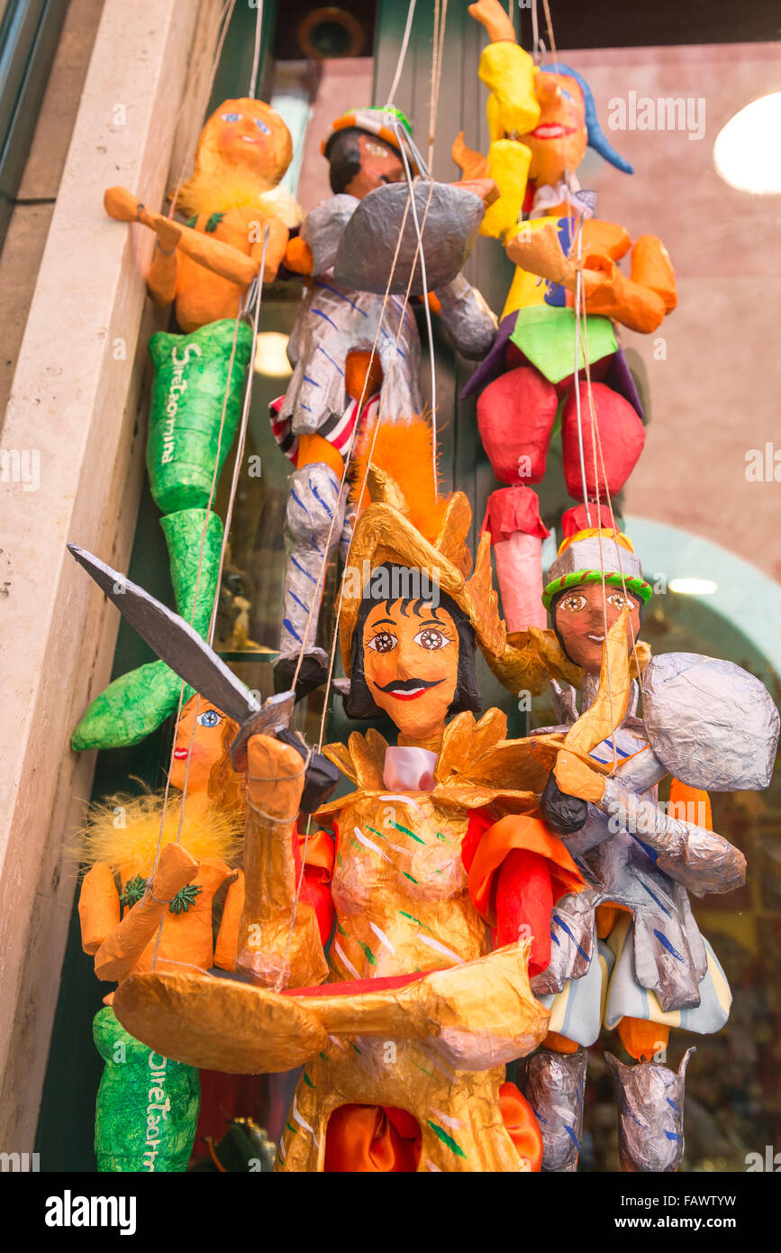 Puppet Sicily, view of colourful traditional papier mache puppets for sale on the Corso Umberto l in Taormina, Sicily. Stock Photo