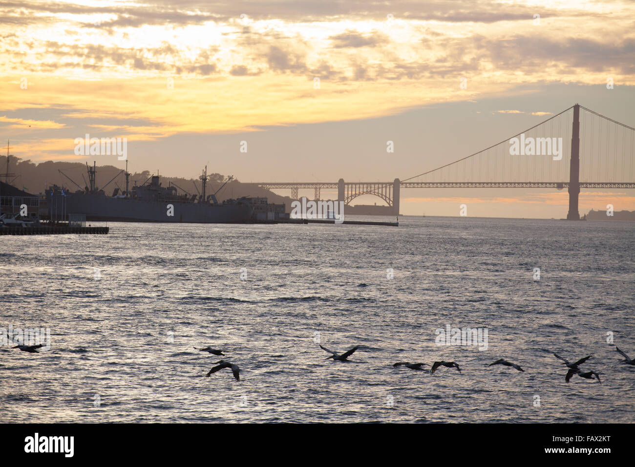 Golden Gate Bridge from San Francisco Bay at sunset Stock Photo