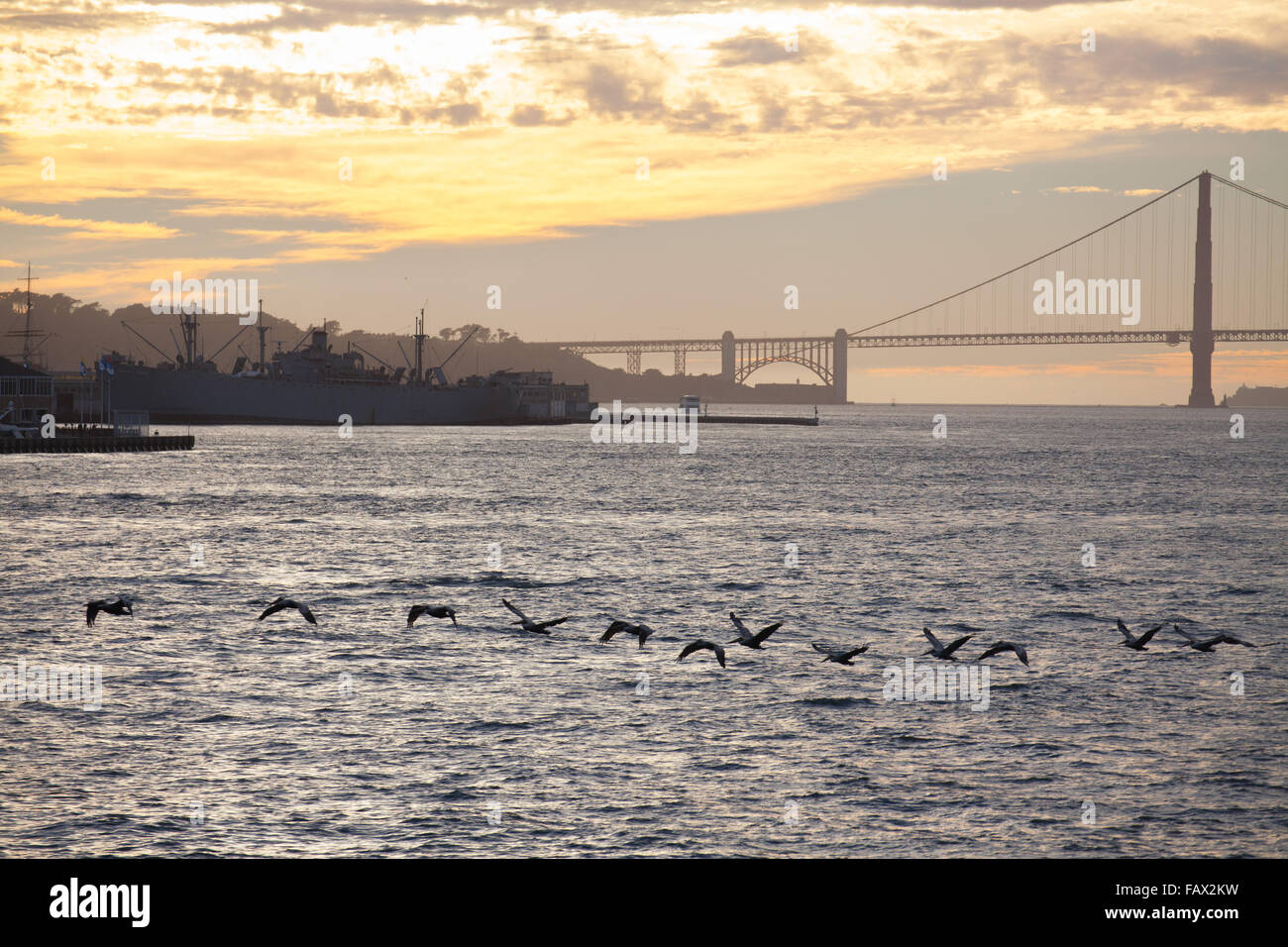 Golden Gate Bridge from San Francisco Bay at sunset Stock Photo