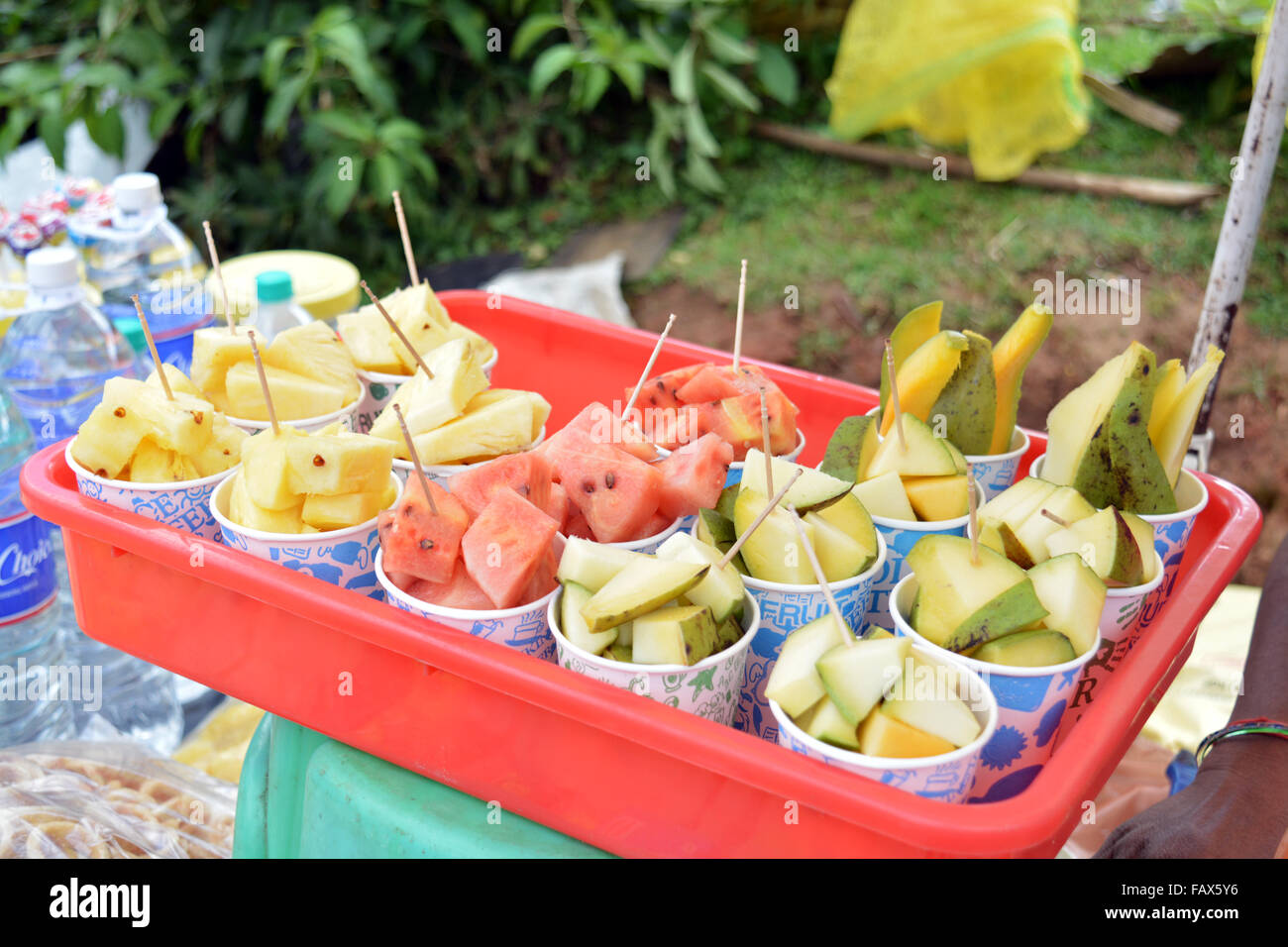 Fresh cut fruits at street shop Stock Photo Alamy