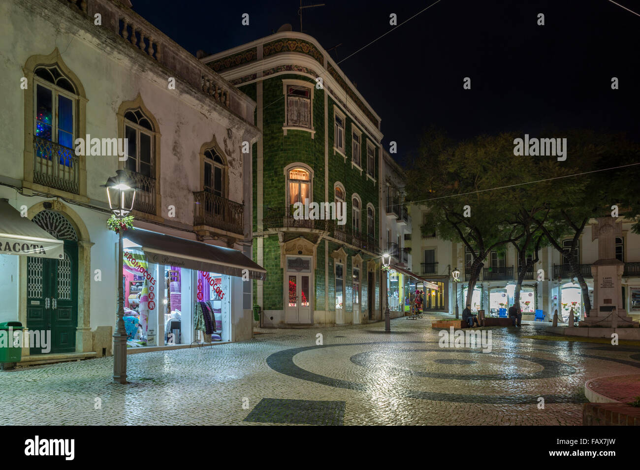Traditional green tiled house in the town square, Praca de Camoes,  Lagos, Portugal, at night. Stock Photo