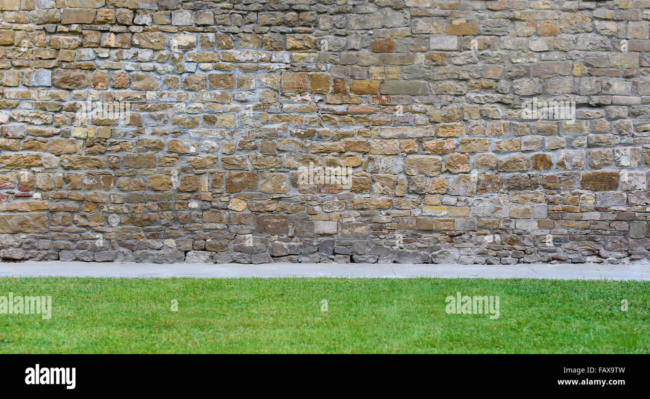 wall next to grass floor edge background Stock Photo Alamy