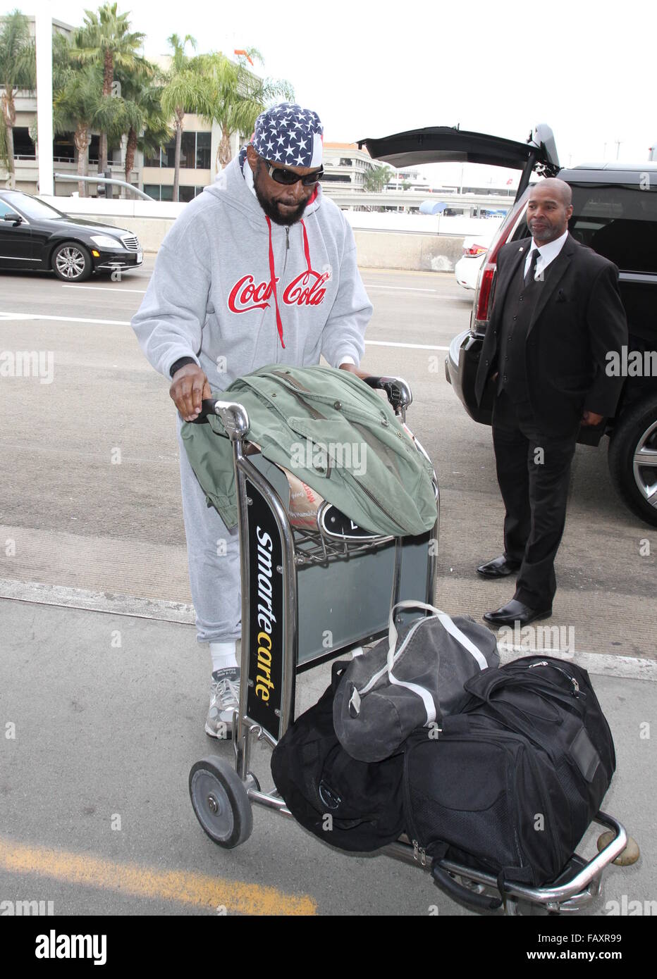 Mr. T arrives at Los Angeles International Airport (LAX) for a departing flight  Featuring: Mr. T Where: Los Angeles, California, United States When: 04 Dec 2015 Stock Photo