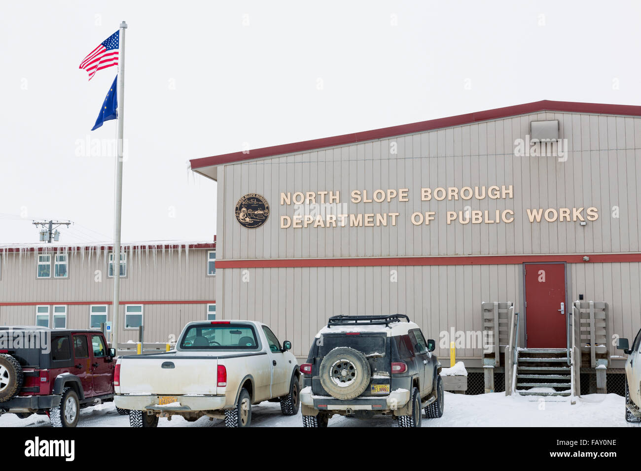 Cars parked outside the North Slope Borough Department of Public Works