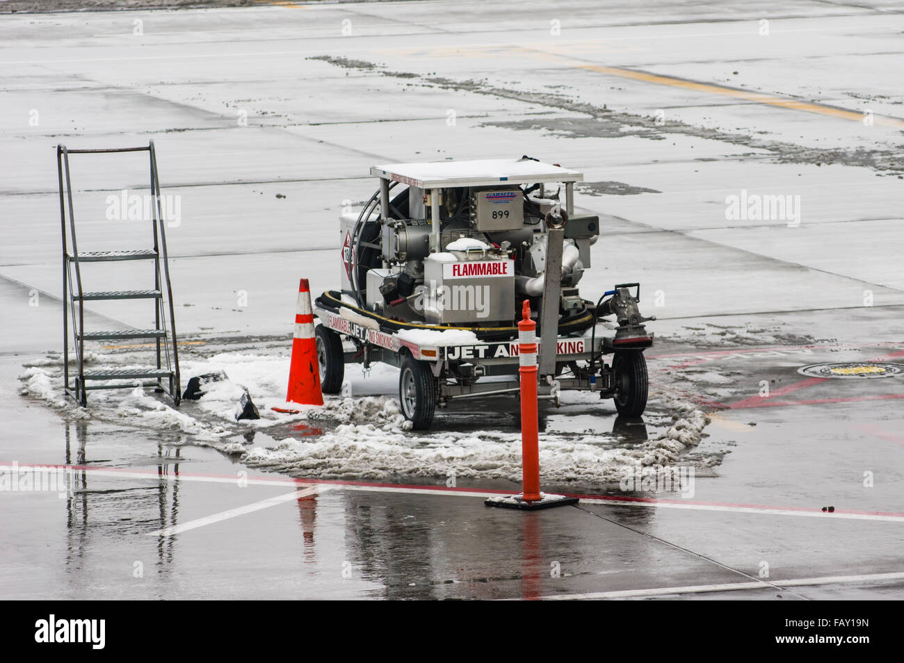 Mobile fuel pump on a snowy runway at Denver International Airport, Denver, Colorado Stock Photo